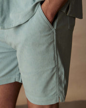 Detail view of teal mist 6" corduroy cabana shorts featuring side pockets and adjustable drawstring.