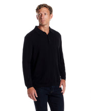 Cotton Cashmere Long Sleeve Polo in Black model wearing a classic fit, soft and lightweight knit attire.