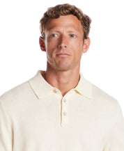 Cotton Cashmere Long Sleeve Polo in Ivory worn by a man, showcasing its lightweight knit and classic collar design.