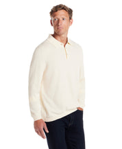 Cotton Cashmere Long Sleeve Polo in Ivory worn by model, showcasing soft lightweight knit and classic polo collar.