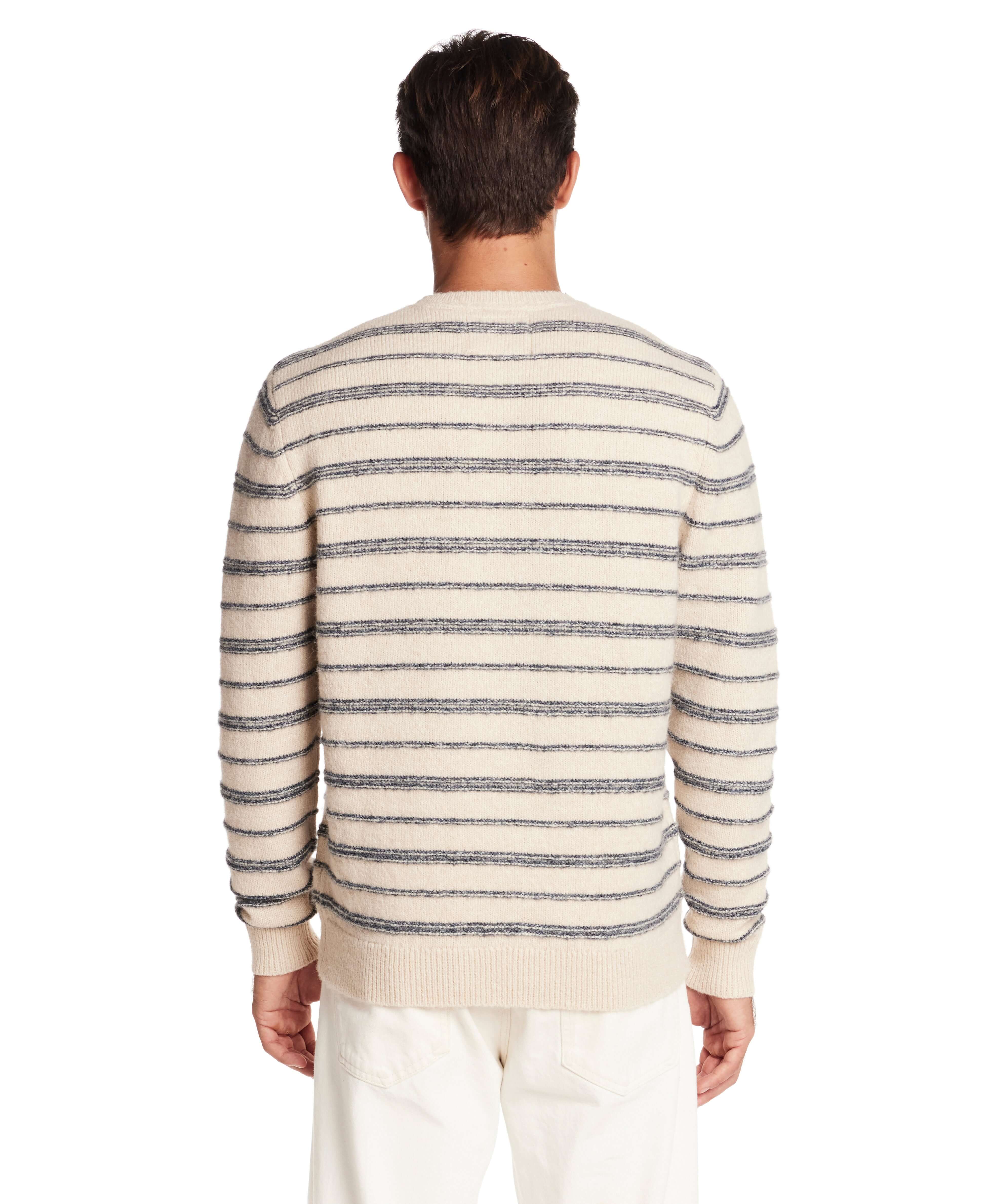 Back view of a fuzzy striped crew sweater in cream and blue, showcasing its classic fit and soft texture.