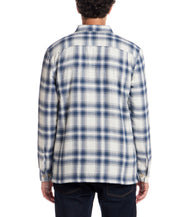Back view of the Sherpa Lined Flannel Shirt Jacket in Iron Blue, showcasing the plaid pattern and comfortable fit.