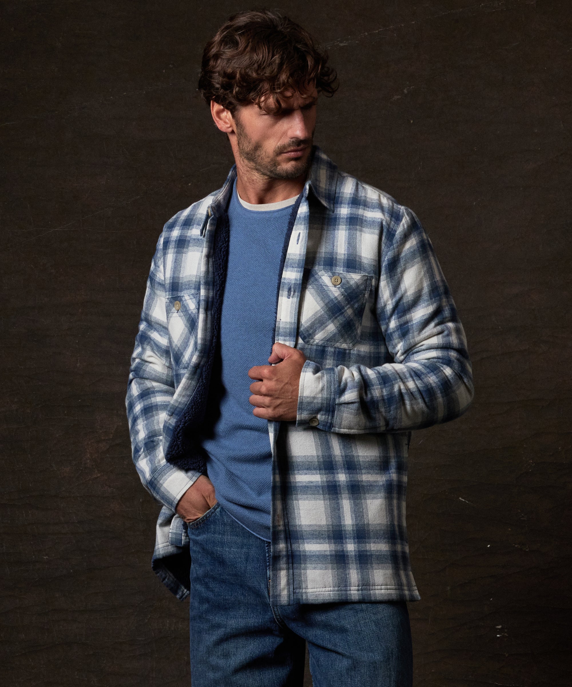 Sherpa Lined Flannel Shirt Jacket in Iron Blue worn by a model, showcasing its cozy design and relaxed fit.