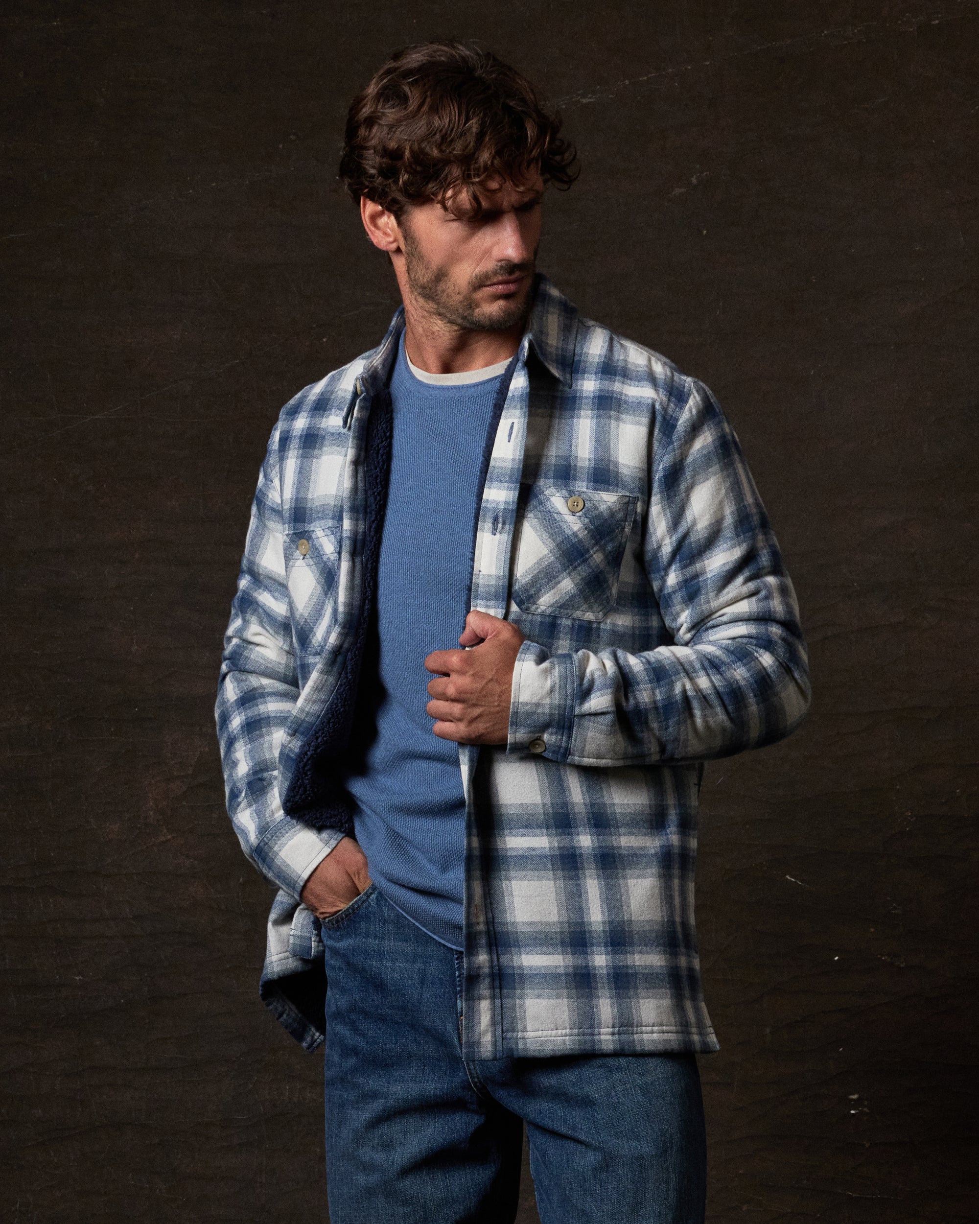 Sherpa Lined Flannel Shirt Jacket in Iron Blue worn by a model, showcasing its cozy design and relaxed fit.