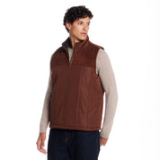 Sherpa Lined Mixed Media Puffer Vest in Cappuccino on a model showcasing its classic fit and texture.