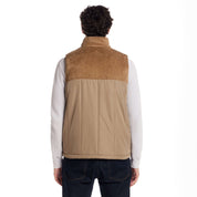 Sherpa Lined Mixed Media Puffer Vest in Kangaroo, showcasing the back view with soft sherpa and durable fabric panels.