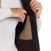 Sherpa Lined Mixed Media Puffer Vest in Kangaroo showcasing soft sherpa interior and convenient pockets for warmth and utility.