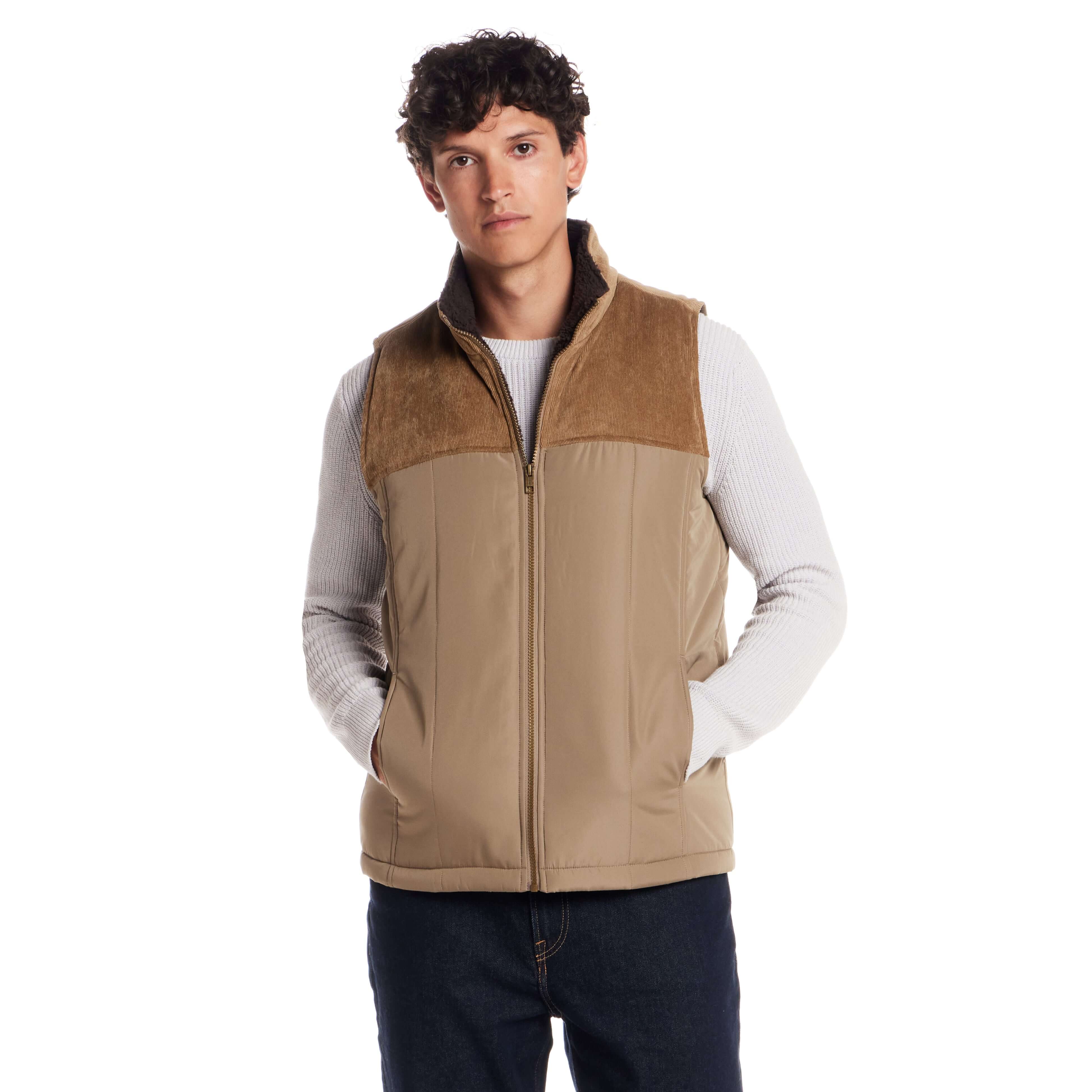 Sherpa Lined Mixed Media Puffer Vest in Kangaroo worn by a model, featuring corduroy yoke and soft sherpa lining.