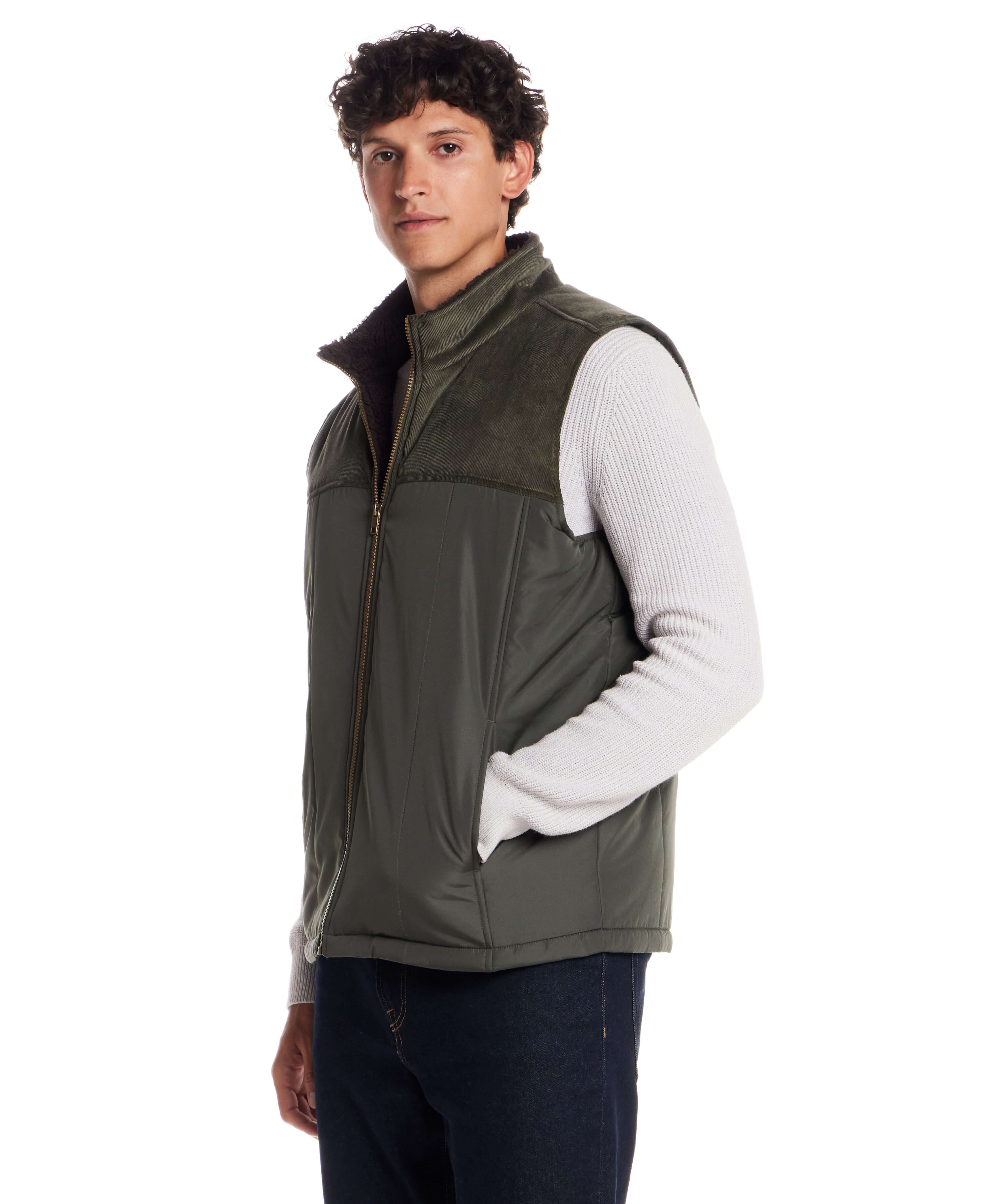 Sherpa Lined Mixed Media Puffer Vest in Kambaba Olive worn by model, showcasing rugged design and soft sherpa lining.