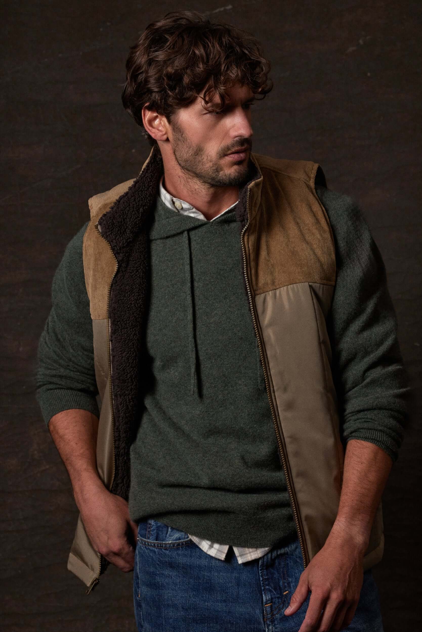 Sherpa Lined Mixed Media Puffer Vest in Kangaroo showcased on model, highlighting its rugged style and cozy design.