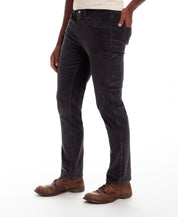 Model wearing Superfine Cord Pants in Forged Iron, showcasing a straight-leg cut and fine wale texture.