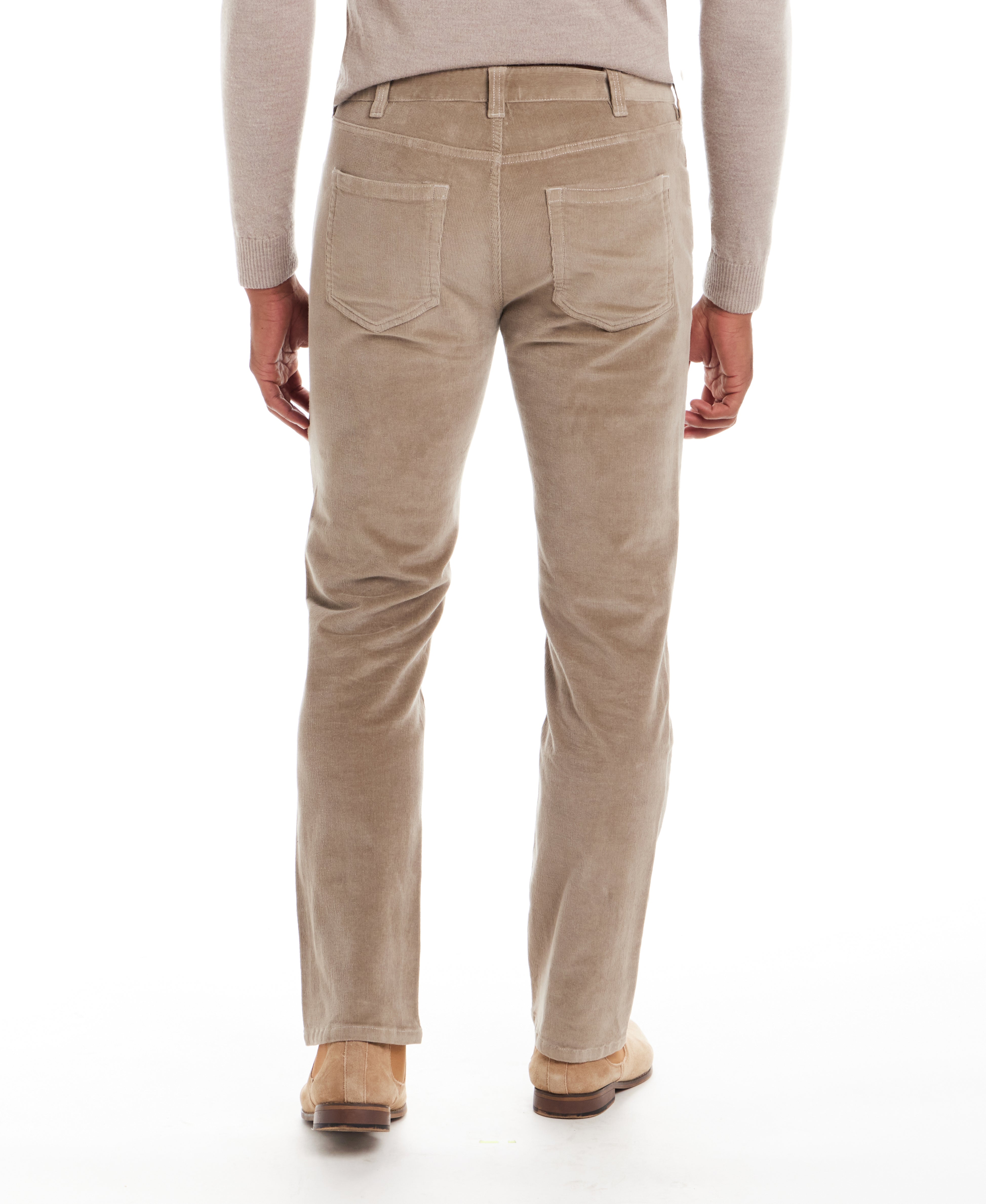 Model wearing Superfine Cord Pants in Stone from the back, showcasing the refined straight-leg fit and soft wale texture.