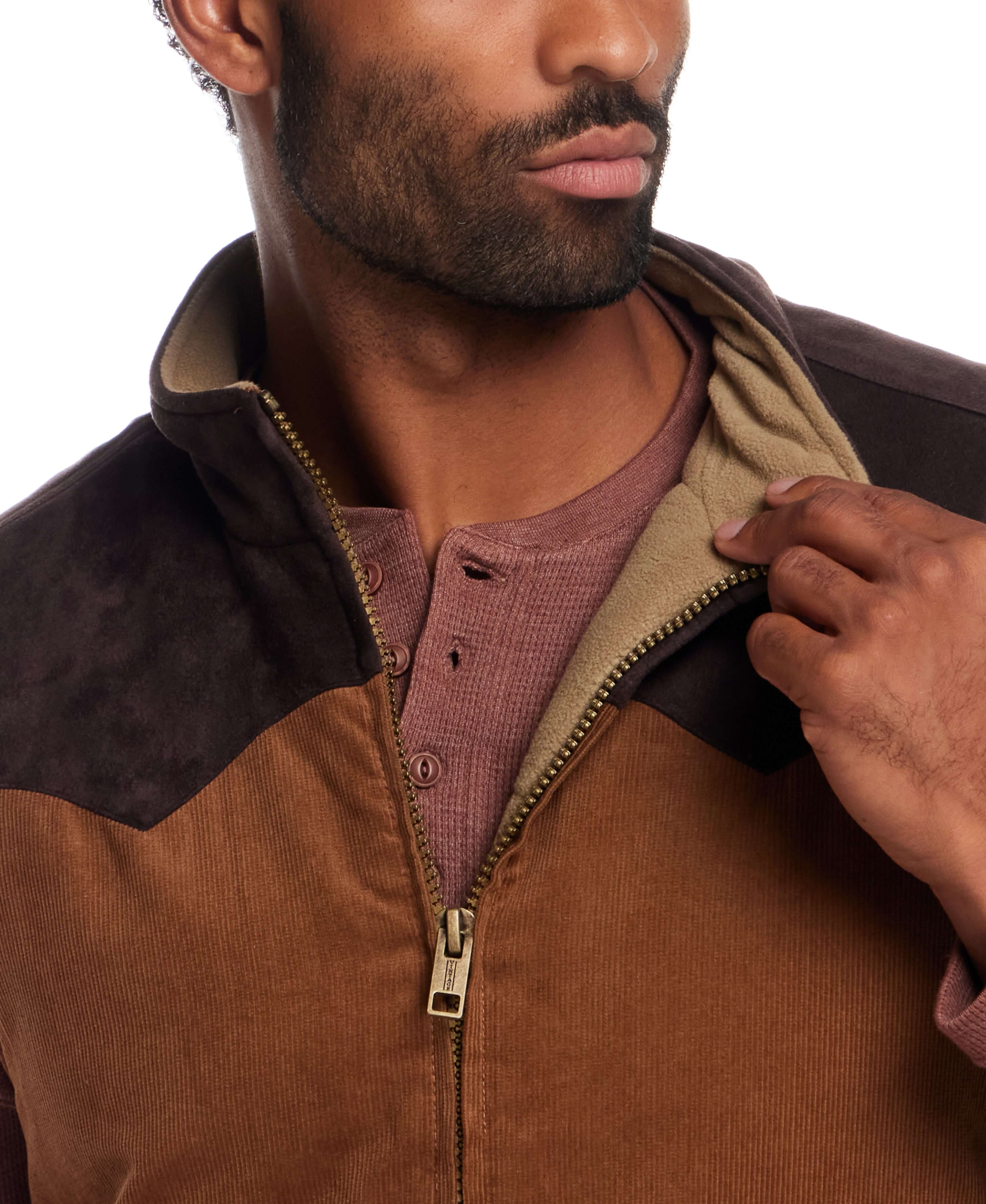 Close-up of a man wearing a Western Cord and Suede Vest in Chocolate Torte with zip front and faux suede detailing.