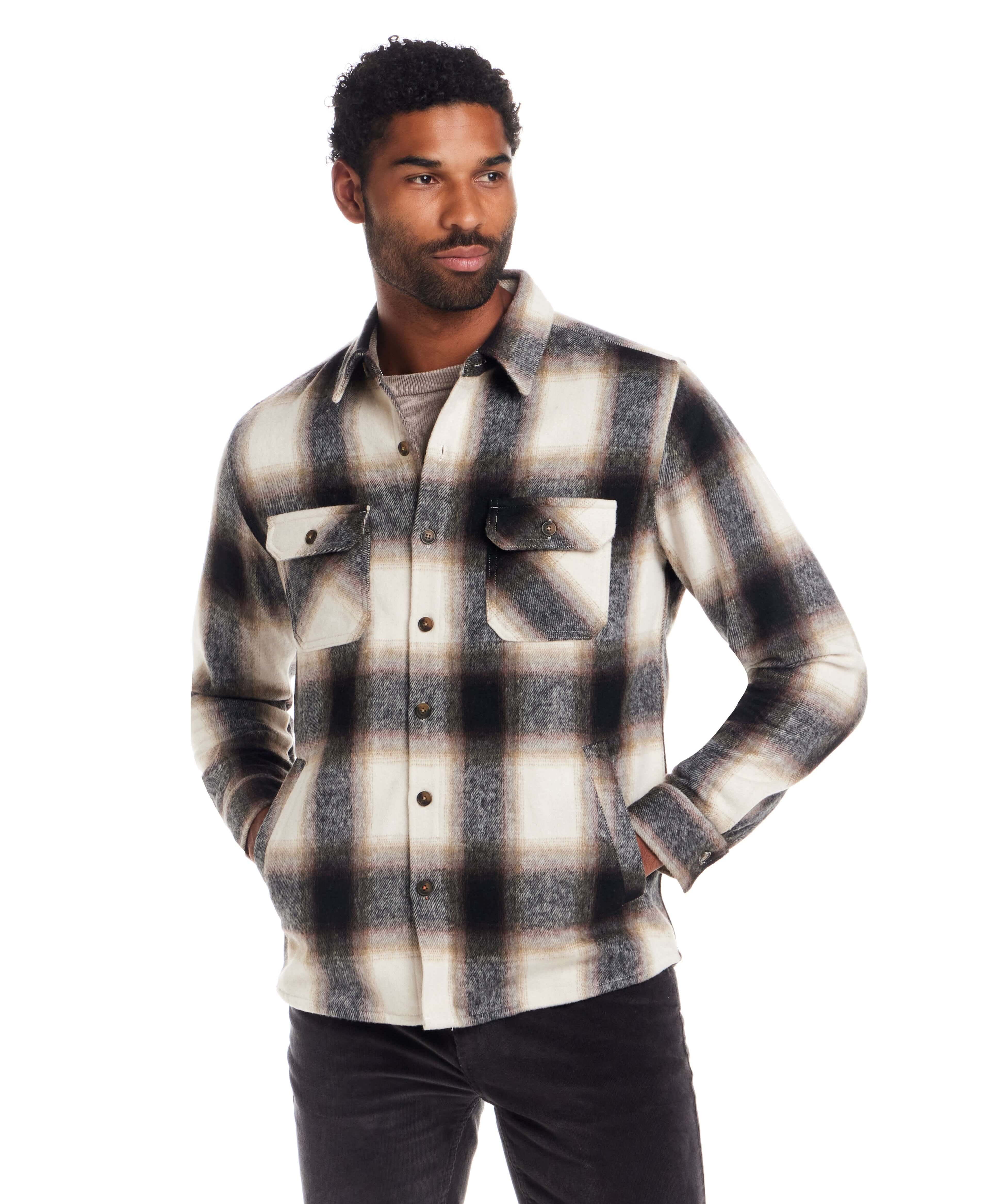 Man wearing a Brushed Unlined Plaid Shirt Jacket in Chocolate Cream with button front and chest pockets.