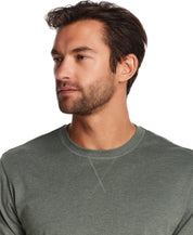 Long Sleeve Brushed Jersey Crew in Duck Green worn by a model, showcasing its classic crewneck and ribbed cuffs.