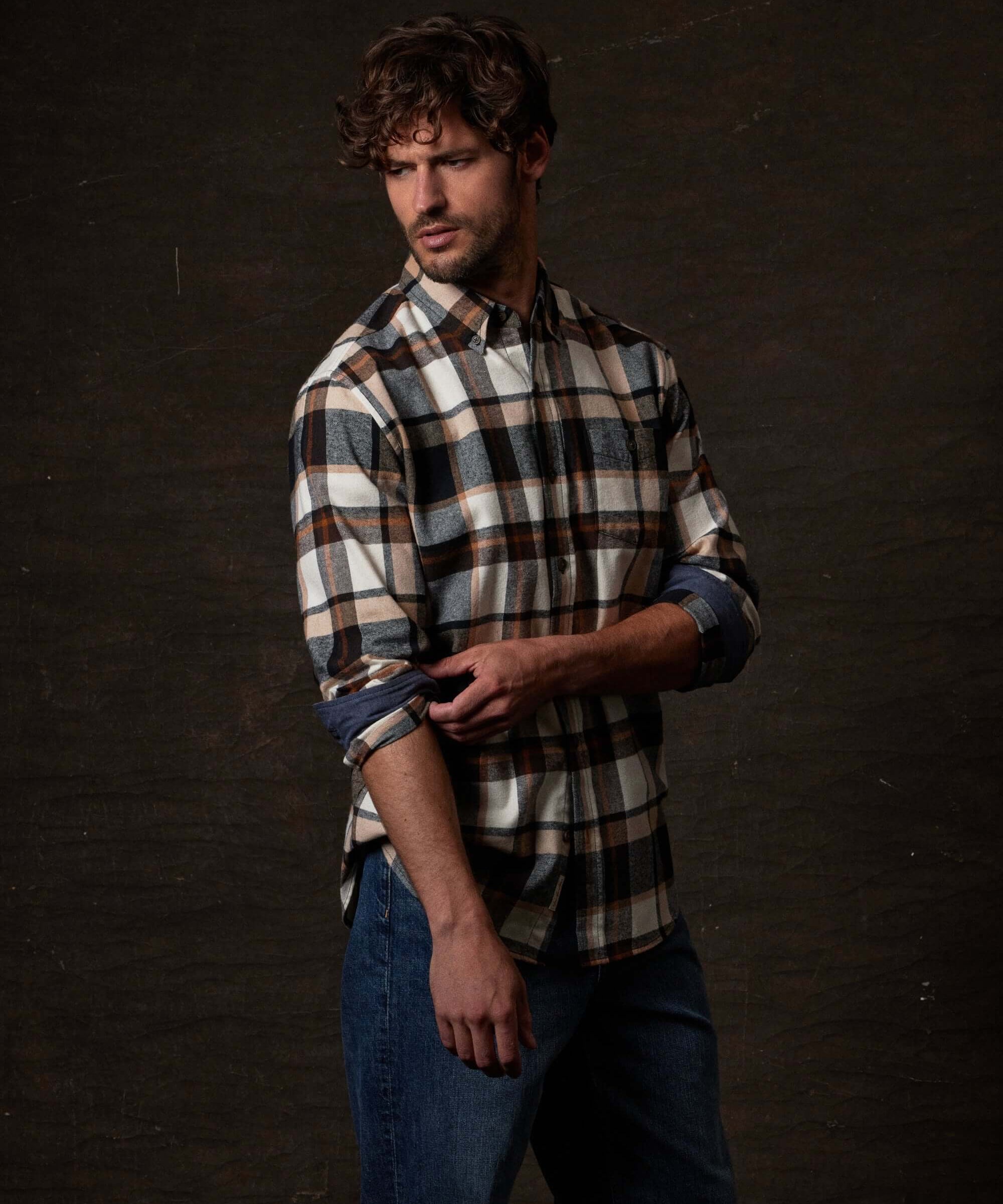 Long Sleeve Brushed Flannel in Caramel Cafe worn by a man, featuring a classic plaid design and button-down collar.