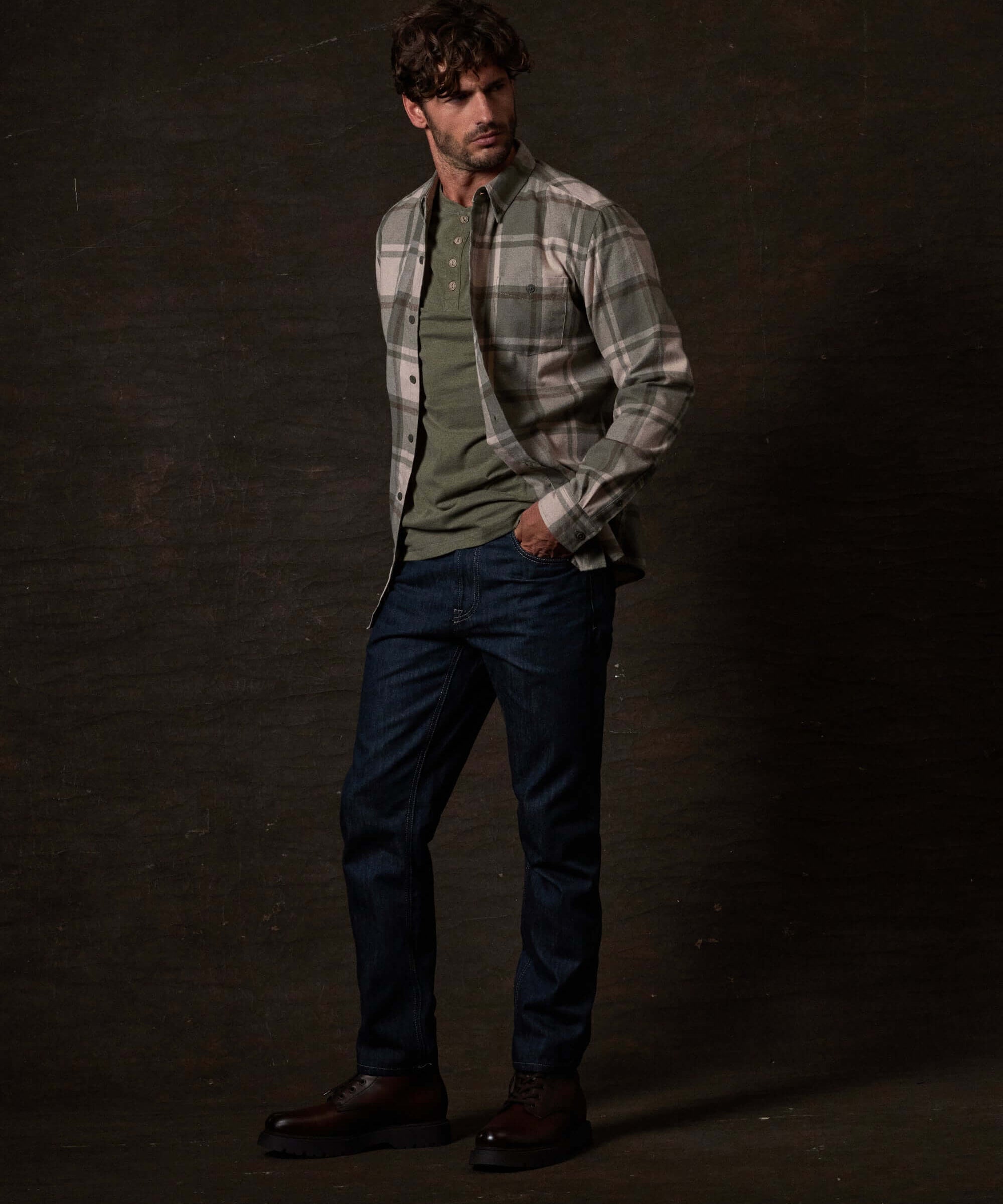 Long Sleeve Brushed Flannel in Kalamata worn with jeans and an olive t-shirt, showcasing a rugged, classic style.