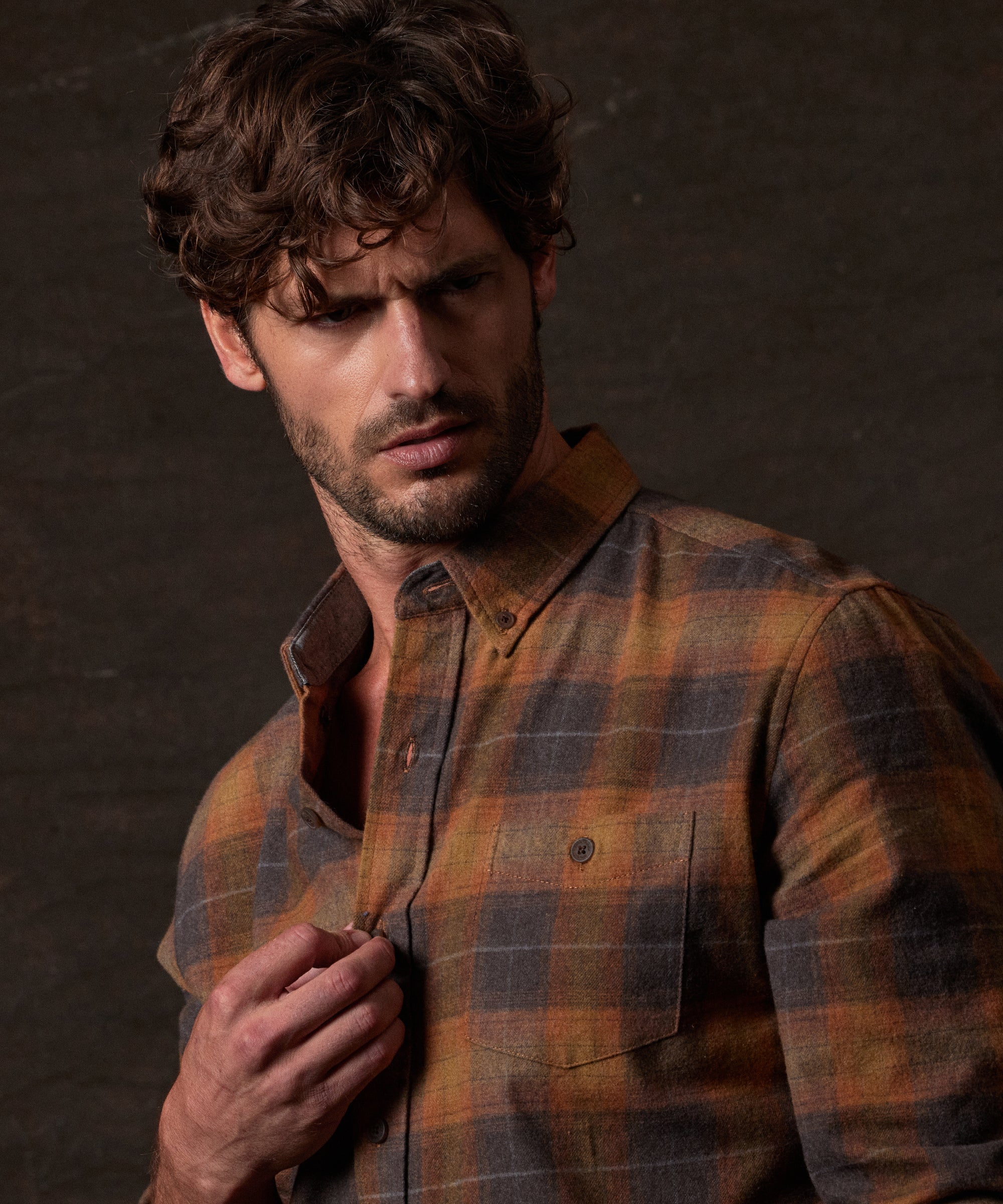 Long Sleeve Brushed Flannel in Pumpkin Spice worn by a model, showcasing its rugged vintage style and soft fabric.