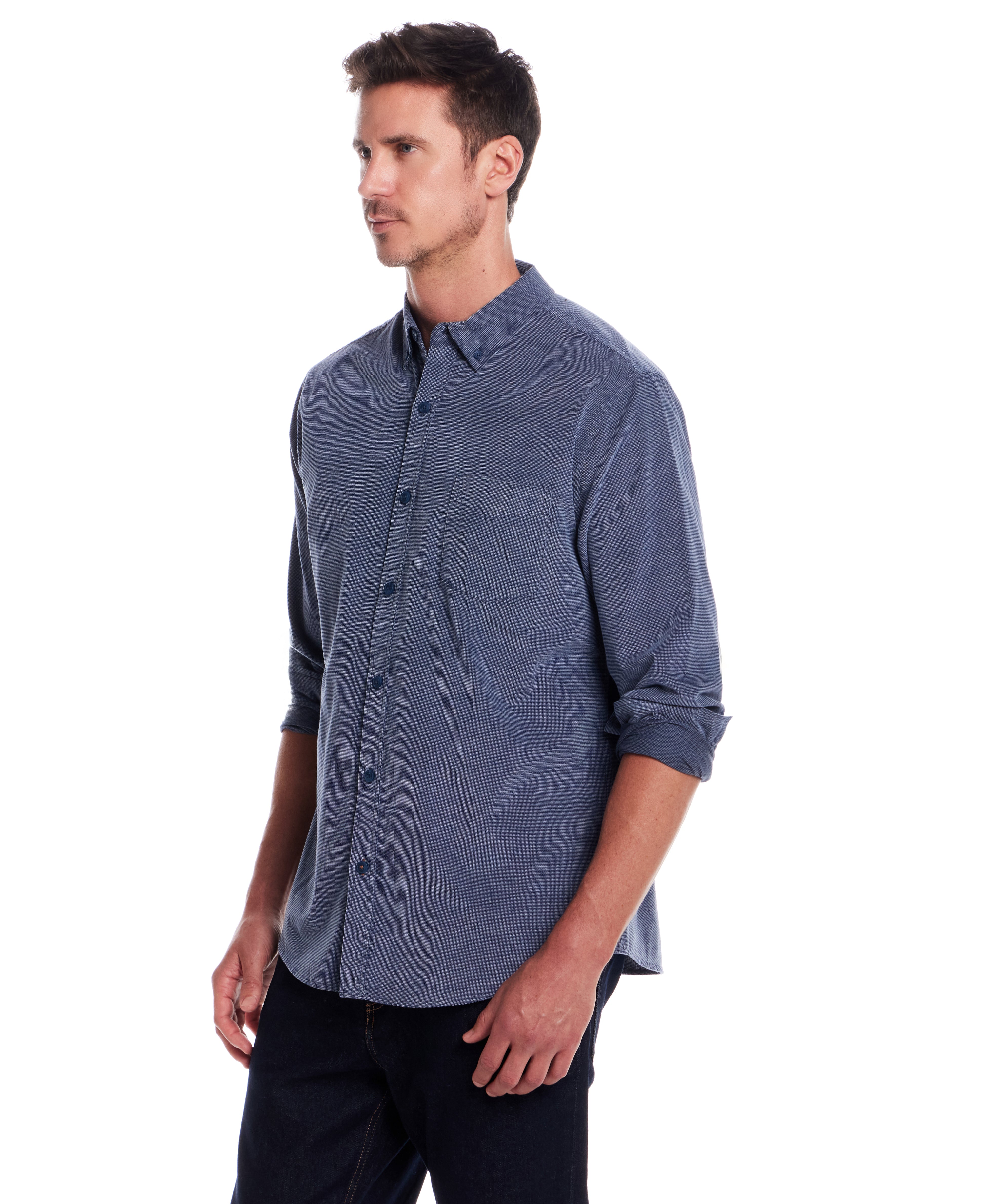 Long Sleeve Pebble Corduroy Shirt in Ensign Blue worn by a model, showcasing button-down collar and cuffed sleeves.