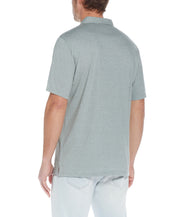 Back view of Micro Stripe Coat Front Knit In Four Leaf Clover showcasing its split side hem and comfort stretch.