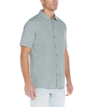 Micro Stripe Coat Front Knit In Four Leaf Clover shown on model with short sleeves and button placket.