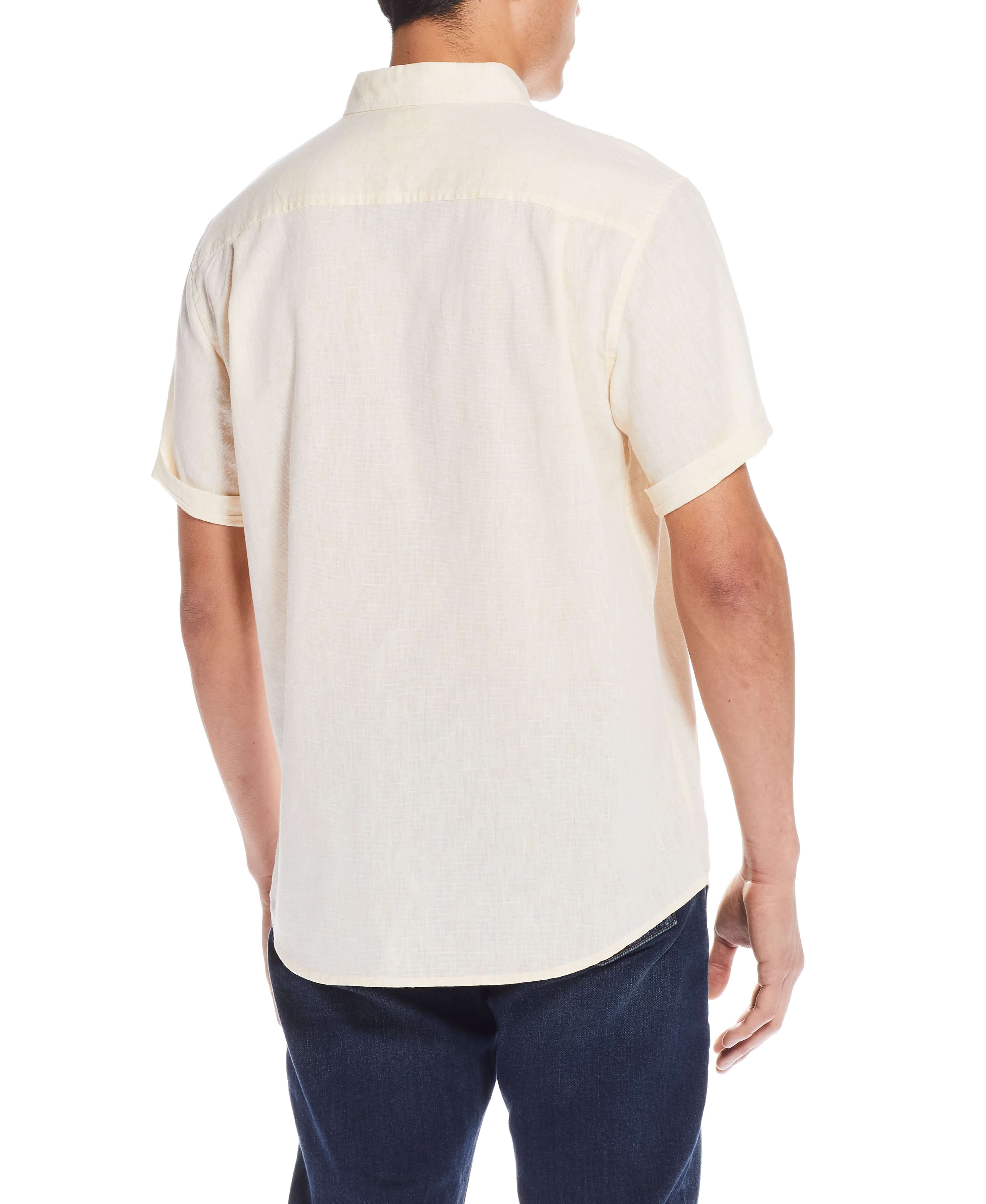 Back view of Short Sleeve Solid Linen Cotton In Cornsilk shirt showcasing its clean and comfortable fit.