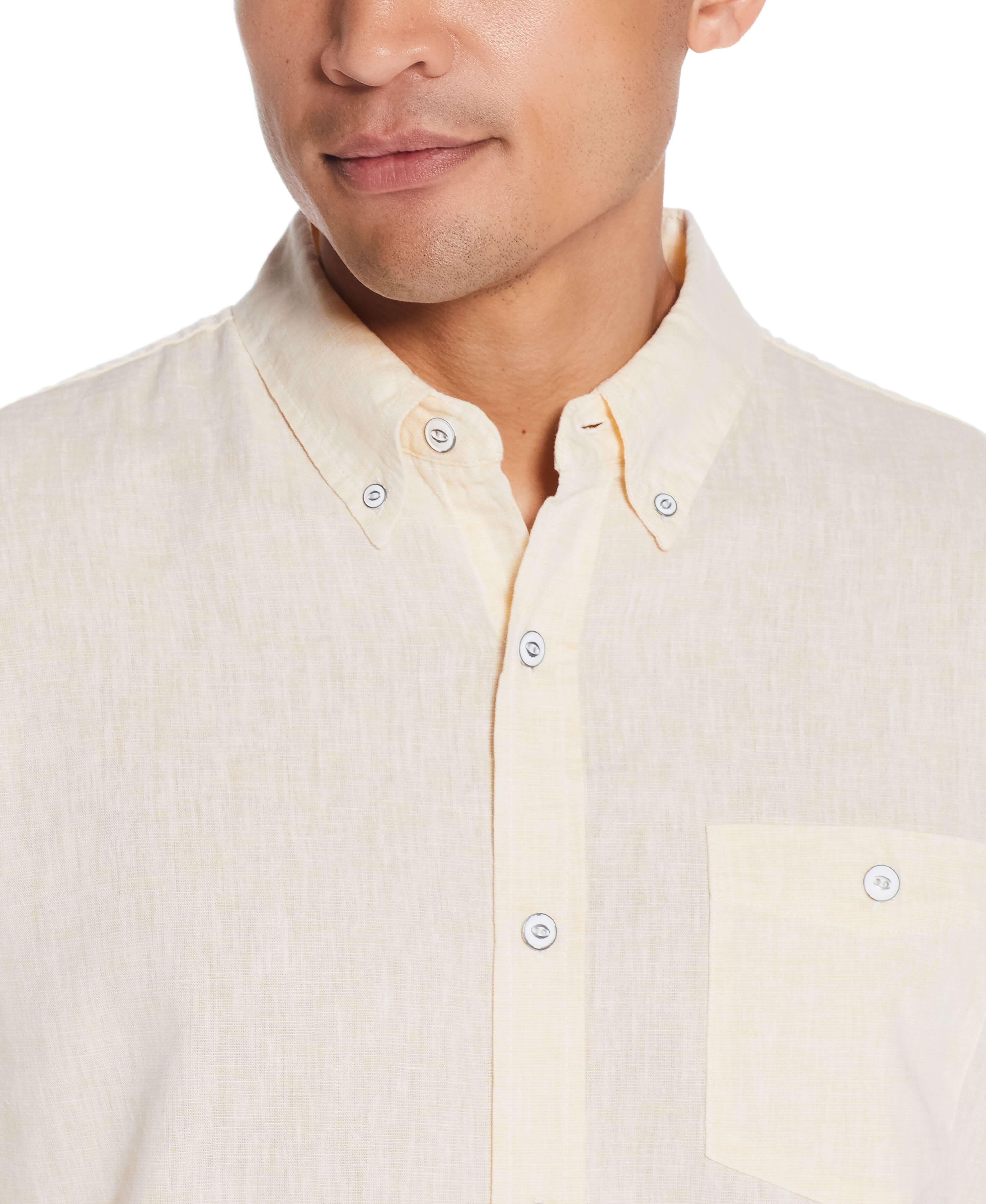 Short Sleeve Solid Linen Cotton In Cornsilk worn by a model with a soft yellow hue and button-down collar, showcasing comfort.
