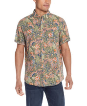 Floral Printed Shirt In Dusty Olive worn by model with a relaxed fit and short sleeves in vibrant floral pattern.