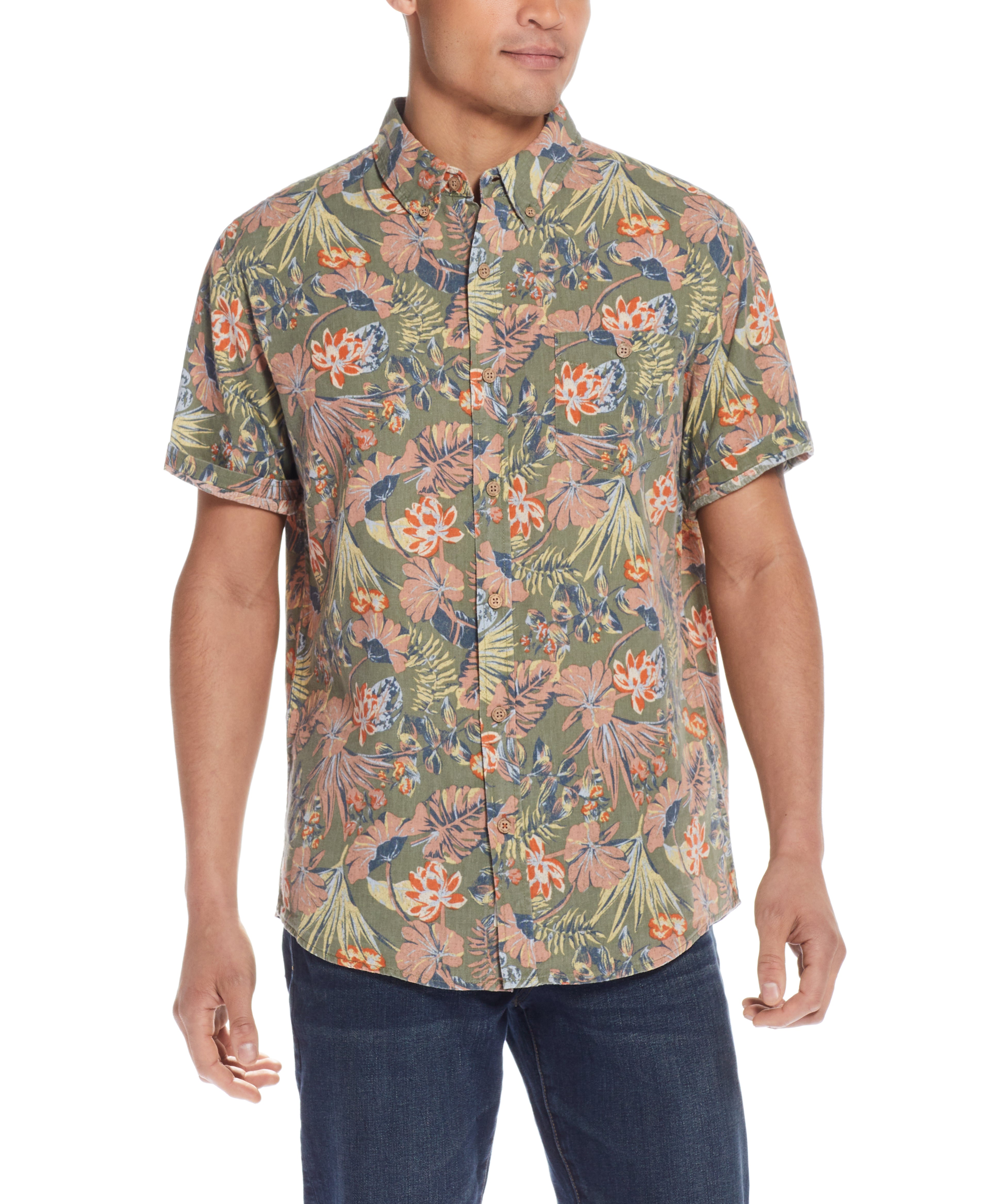 Floral Printed Shirt In Dusty Olive worn by model with a relaxed fit and short sleeves in vibrant floral pattern.