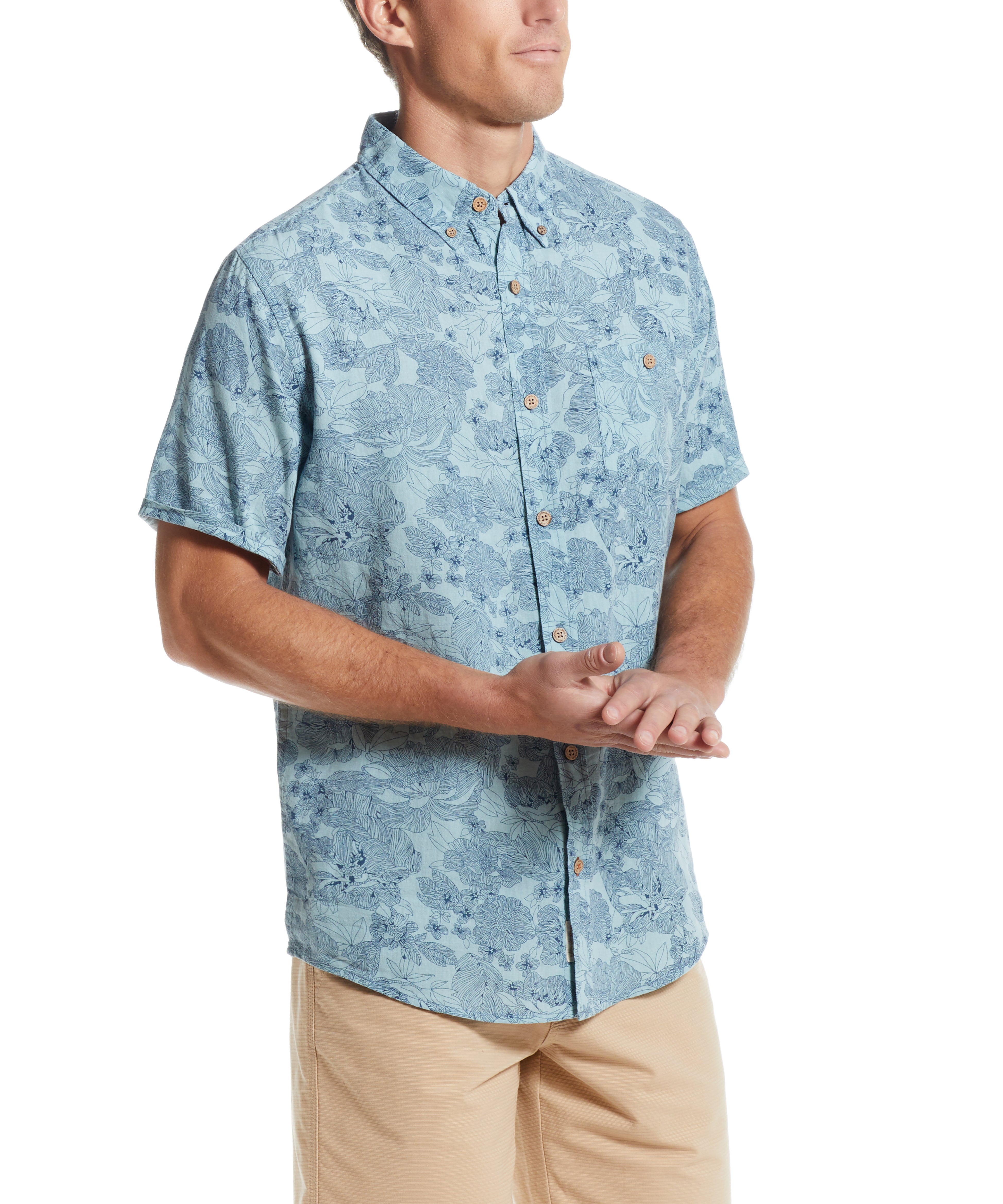 Tonal Floral Printed Shirt In Ensign Blue worn by a man, showcasing a relaxed fit and short sleeves.