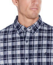 Plaid Seersucker Shirt In Shadow features a button-down collar and short sleeves for summer comfort.