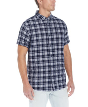 Plaid Seersucker Shirt In Shadow on male model showcasing short sleeves and button down collar.