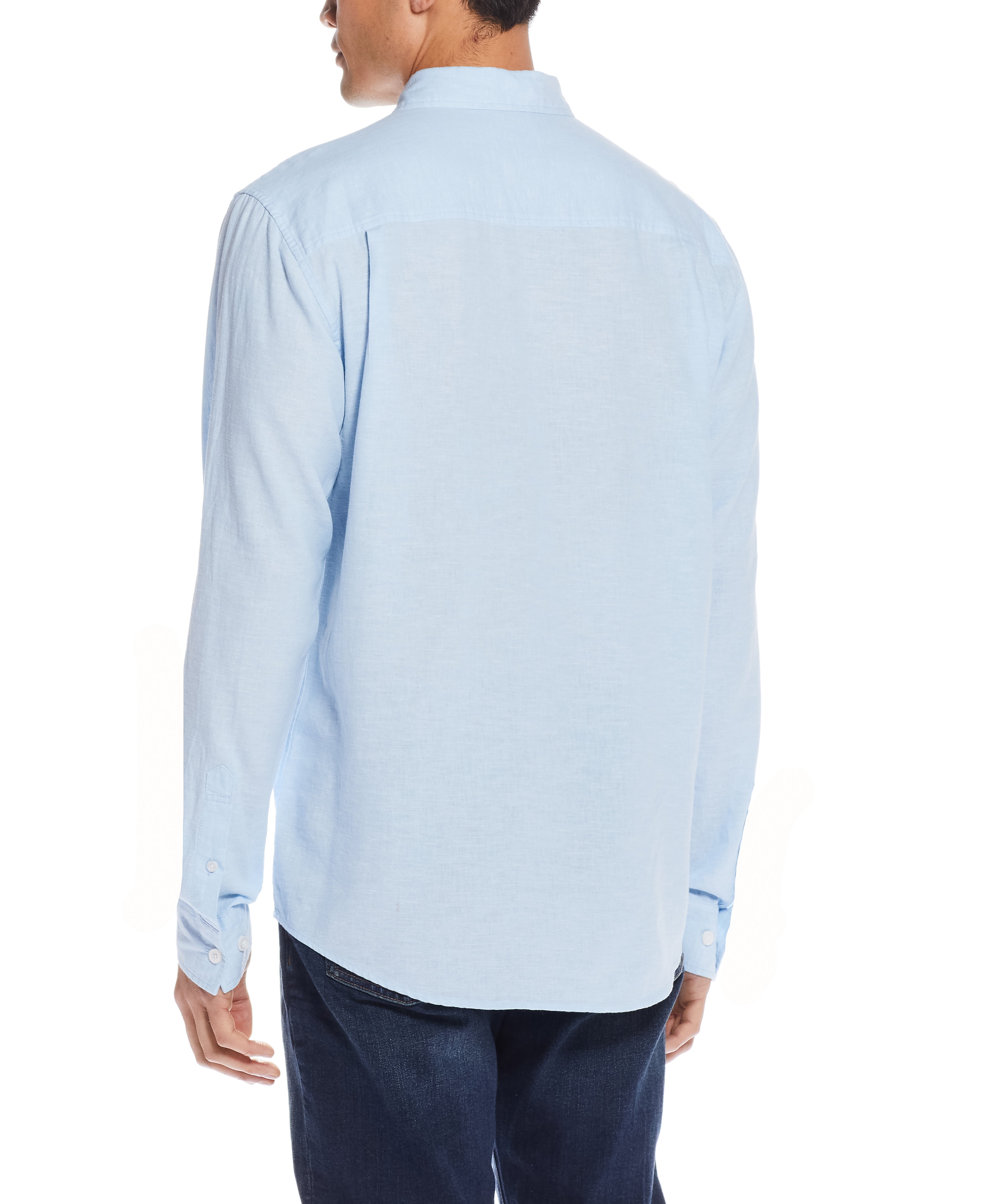 Back view of a man wearing a Long Sleeve Linen Cotton Shirt In Cerulean, showcasing the relaxed fit and lightweight design.
