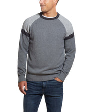 Color Block Raglan Sleeve Crew In Concrete Denim worn by a man, showcasing sporty denim heather color-blocking and classic fit.