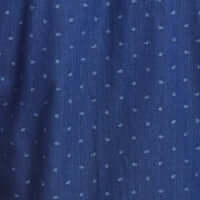 Close-up of a denim dobby fabric in blue nights showcasing a subtle floral print pattern.