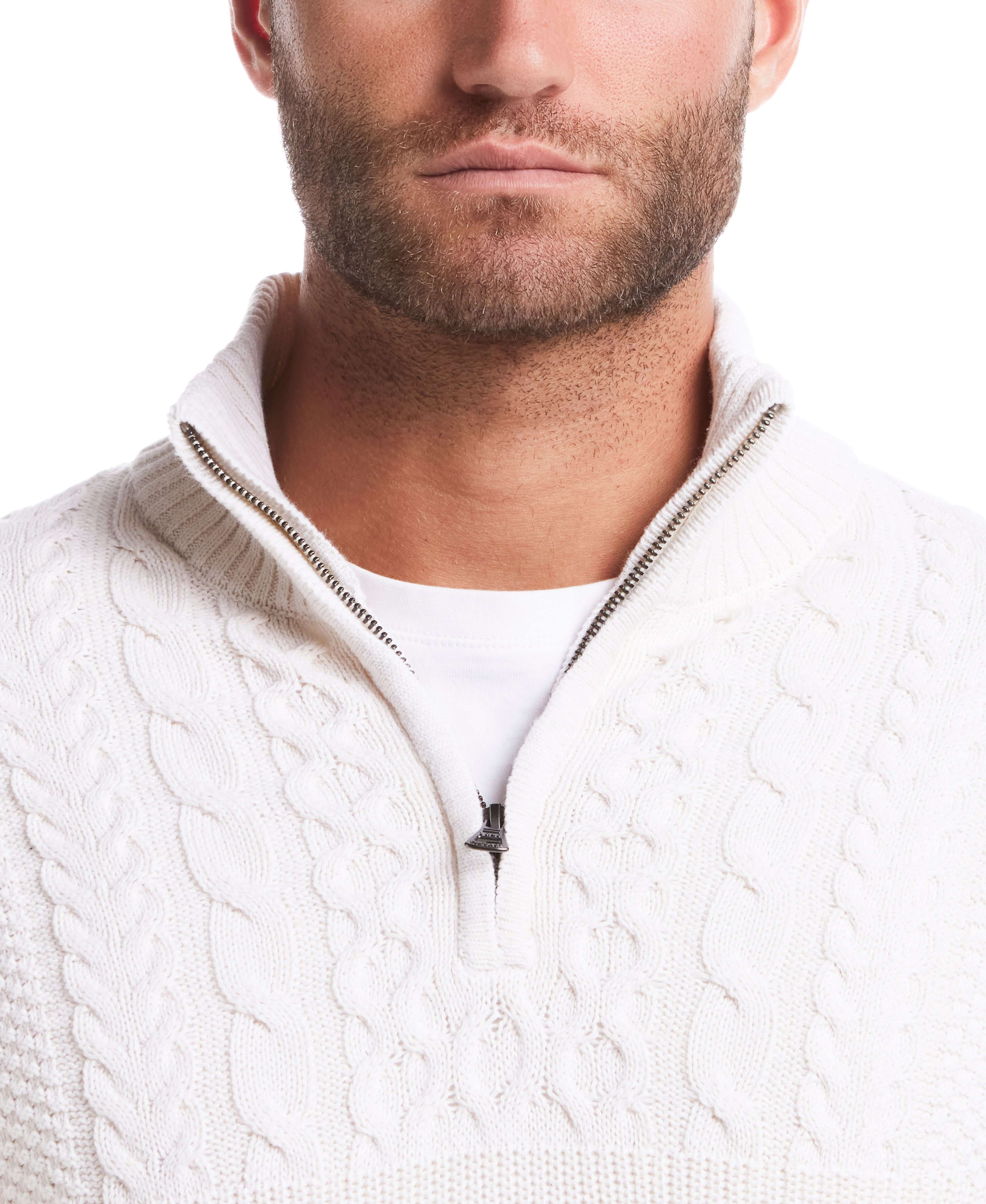 Model wearing the Holiday Cable Yoke Quarter Zip Sweater in Ecru, showcasing its classic Aran cable design and cozy fit.