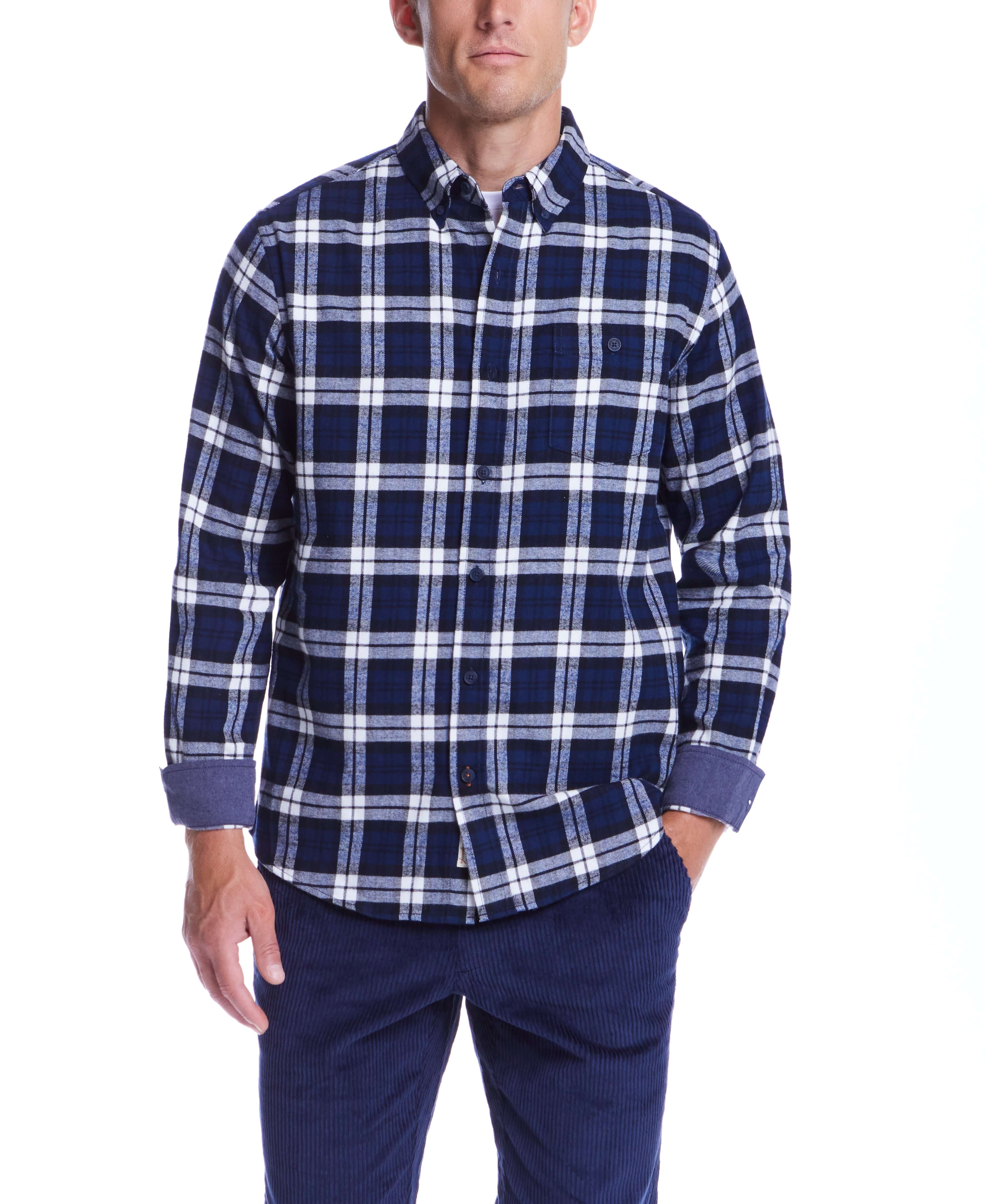 Model wearing a long sleeve blue print brushed flannel shirt with a classic plaid pattern and button-down collar.