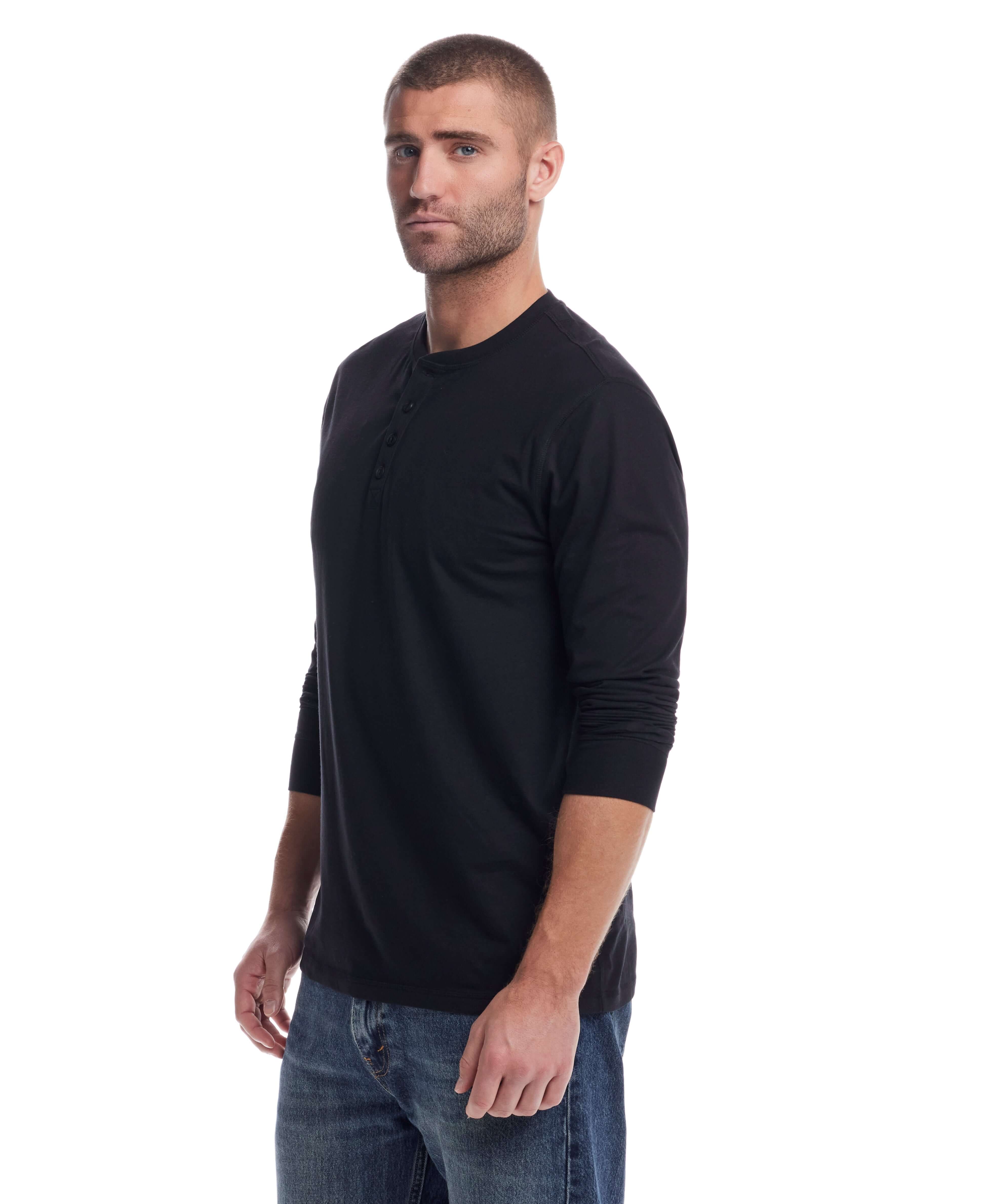 Man wearing a black long sleeve brushed jersey henley, showcasing its premium soft fabric and stylish fit.