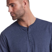Man in maritime blue long sleeve brushed jersey henley shirt, showcasing a relaxed fit and classic design.