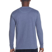 Back view of a medium blue heather long sleeve brushed jersey henley shirt, showcasing its soft fabric and relaxed fit.