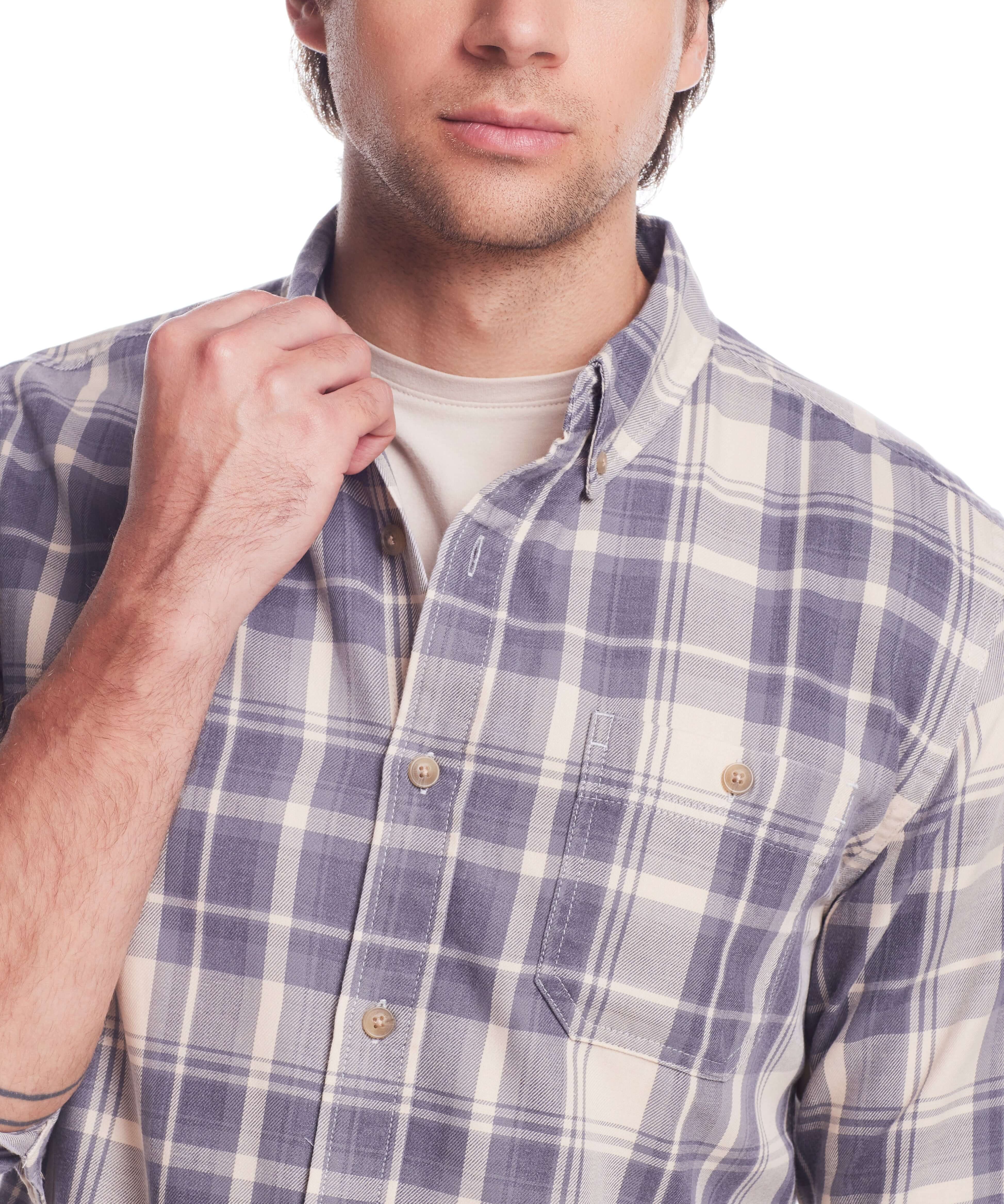 Model wearing long sleeve burnout flannel in natural plaid pattern, showcasing button-down collar and patch pocket.