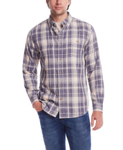 Long sleeve burnout flannel shirt in natural plaid, featuring button cuffs and chest pocket, worn by a male model.