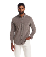Long Sleeve Pebble Corduroy Shirt in Mountain Trail modeled by a man, showcasing casual style with button-down collar.