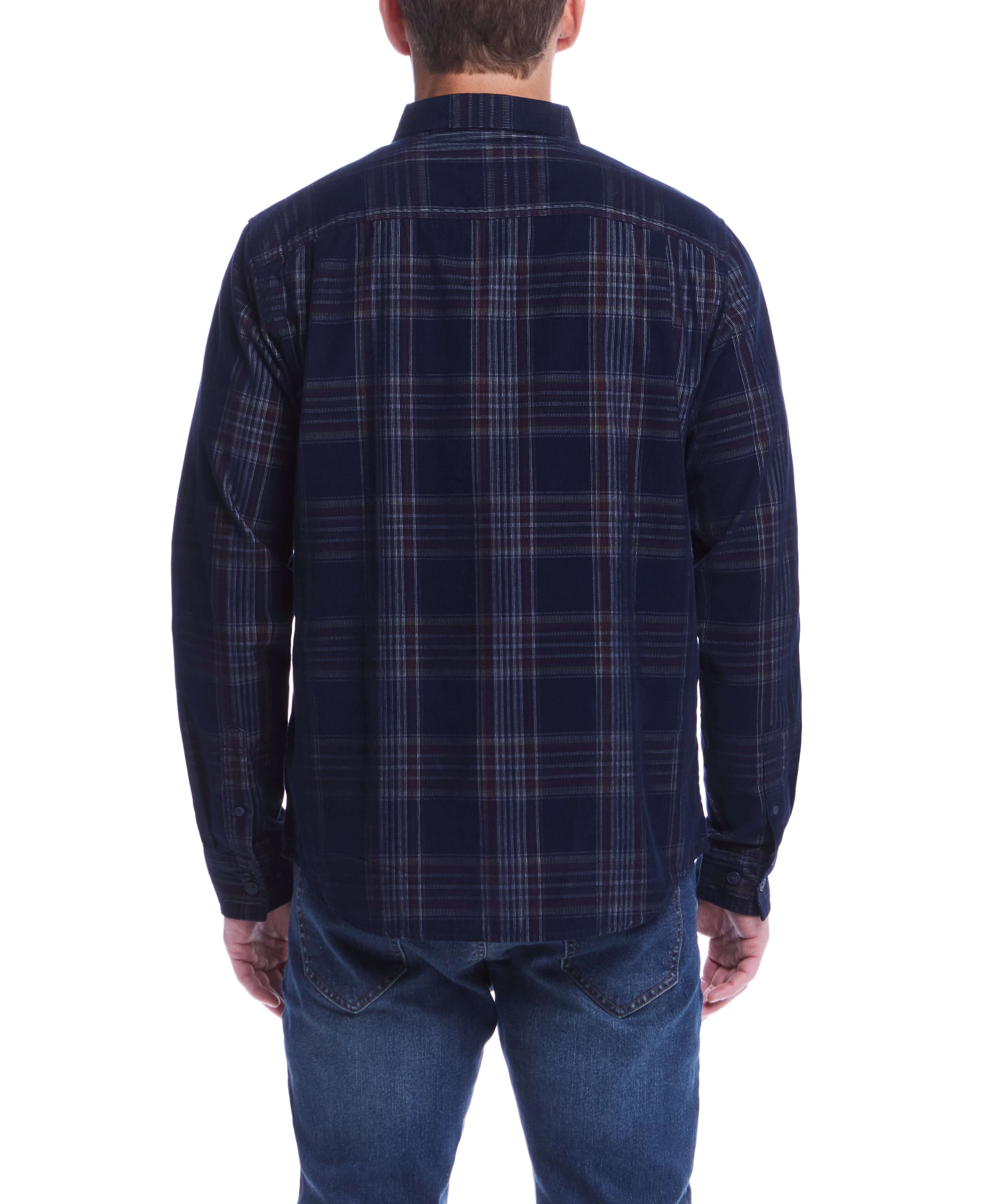 Back view of a man wearing a blue plaid cord shirt, showcasing its soft texture and stylish detail.