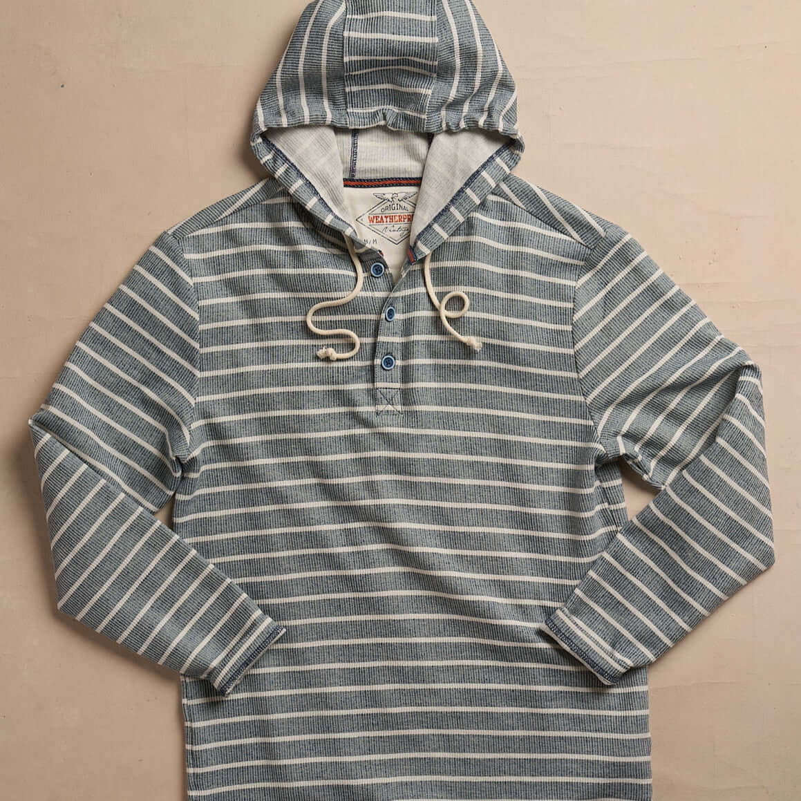 Long sleeve summer hoodie in blue ashes with button placket and drawstring hood, featuring nautical stripes.