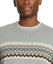 Close-up of a man wearing a Nordic crewneck sweater in pale grey with classic design details.