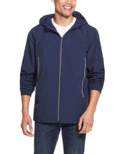 Nylon Zip Front Jacket In Navy worn by a man, showcasing its water and wind resistant features.