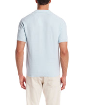 Back view of an Aqua Twist Open Collar Polo Sweater, showcasing lightweight cotton knit and stylish short sleeves.