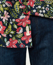 Close-up of Poplin Floral Print In Blue Night shirt showcasing bright floral patterns and soft cotton fabric.