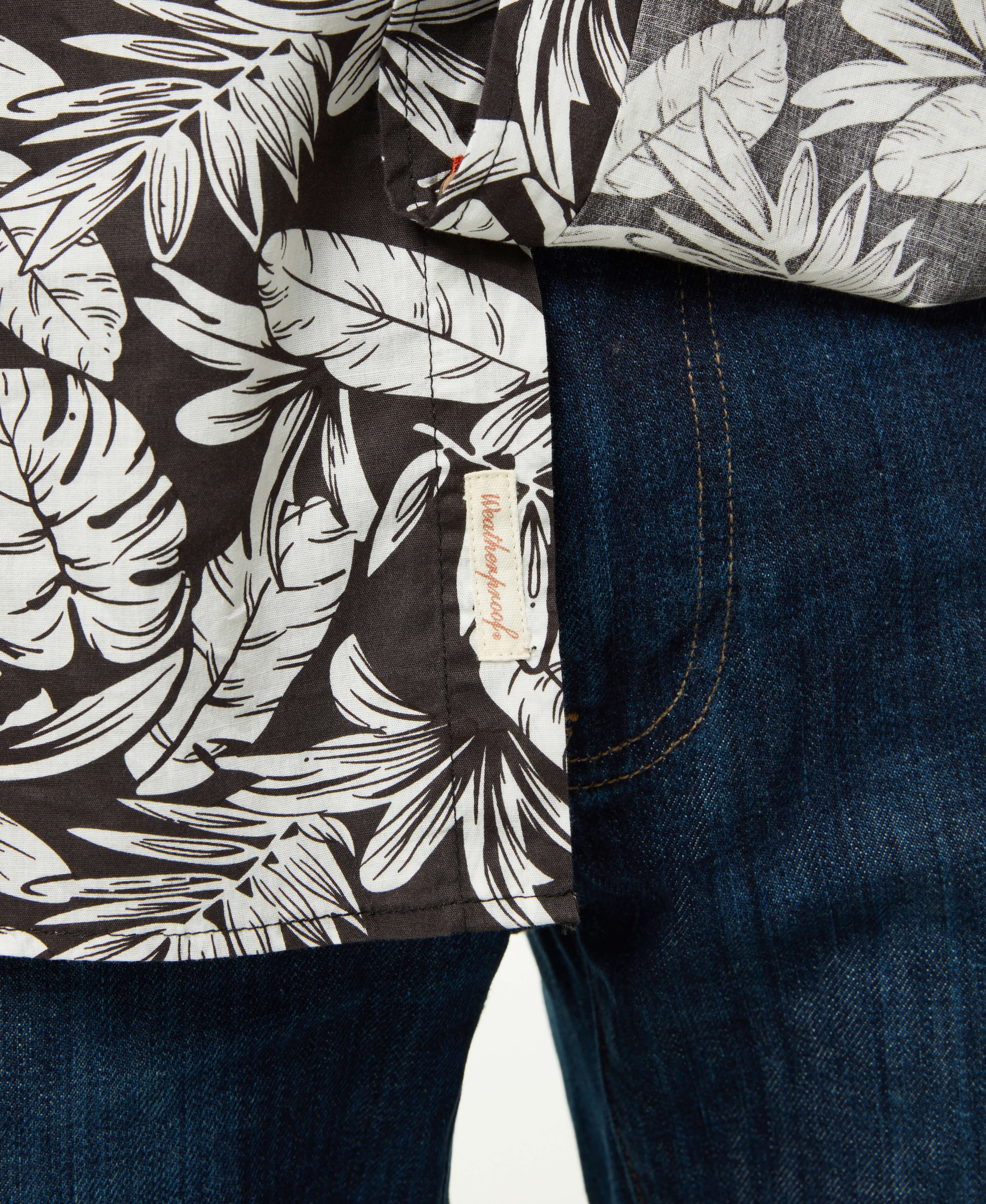Poplin Floral Print In Forged Iron shirt detail with floral design and denim background